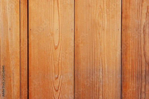 Wood background. Oak wood floor or wall. Wood with nail holes texture. Natural wood plank. Close up of wooden plank wall.