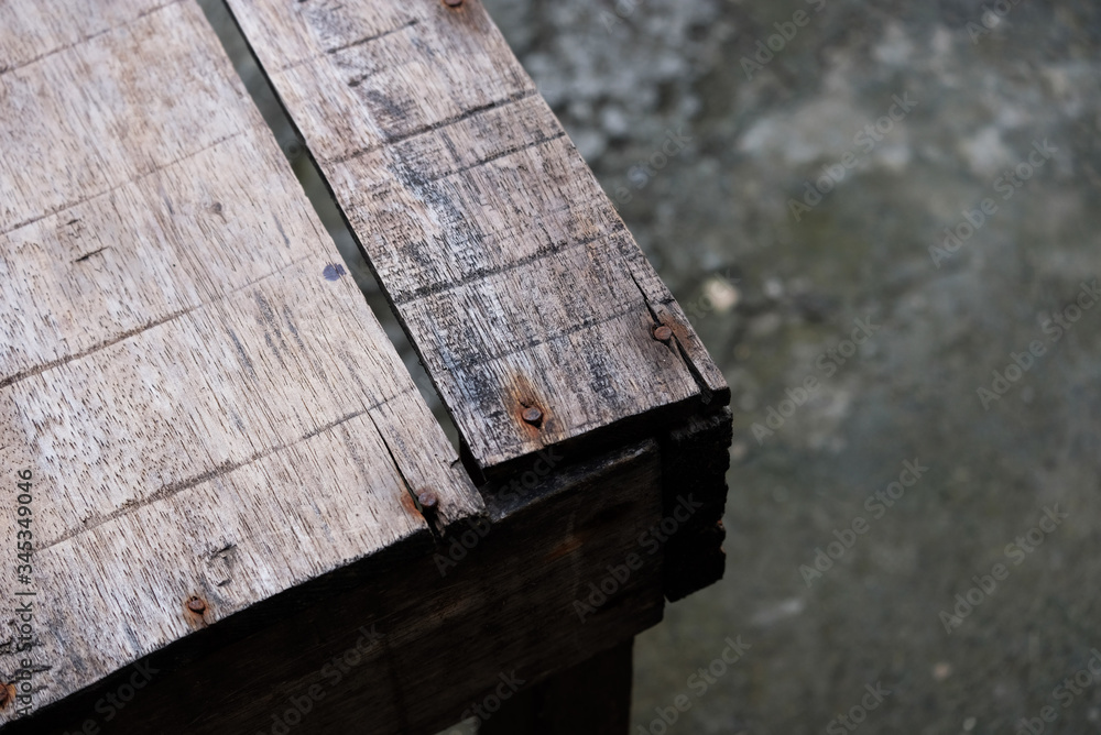 close up of a old wooden table edge close up of a old wooden table edge
