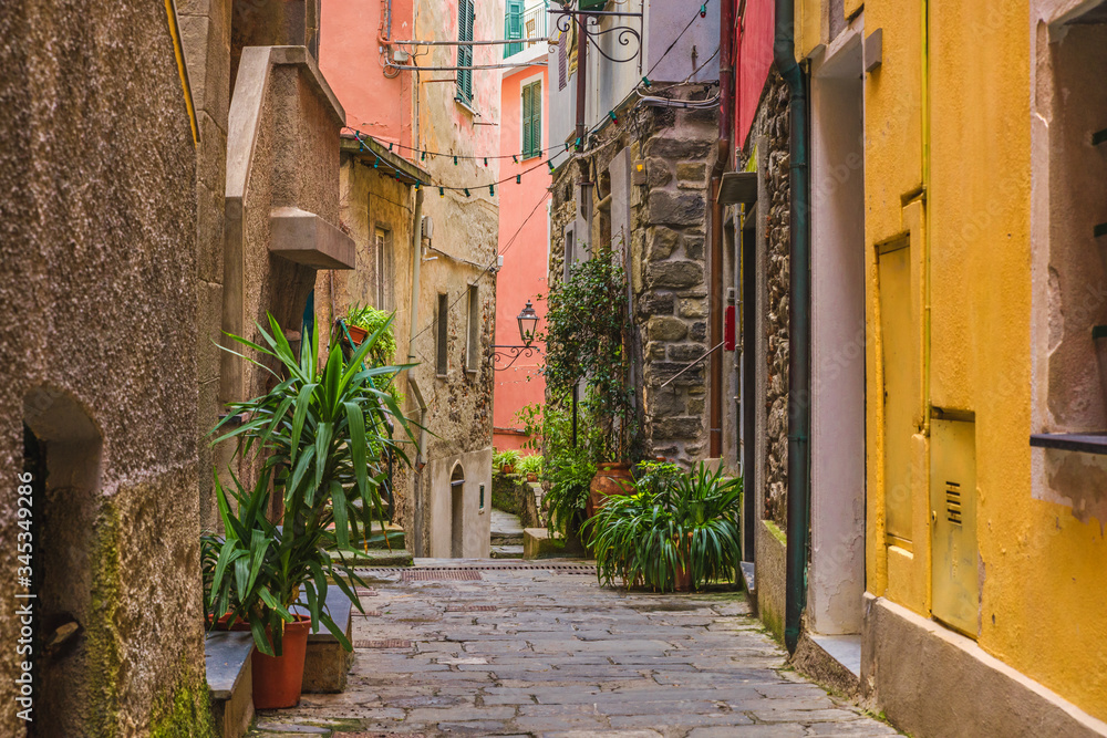 Old medieval street in Italian town Vernazza with nobody on Cinque Terre coast, Liguria, Italy