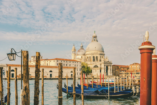 Grand Canal and Basilica Santa Maria della Salute with gondolas, Venice, Veneto, Italy. vintage toning © samael334