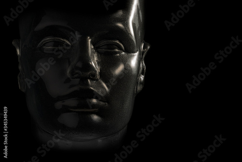 Transparent dummy head on black background