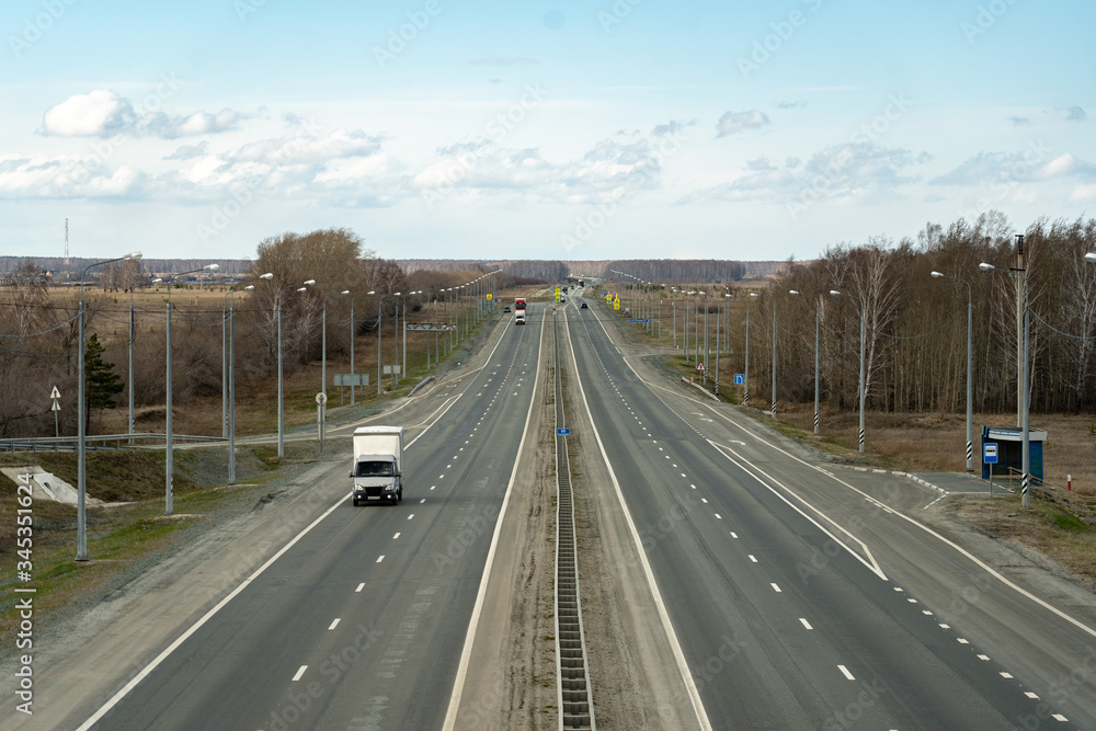The semi-empty highway is quarantined. Reduced traffic due to a virus outbreak. The semi-empty highway is quarantined. Reduced traffic due to a virus outbreak.