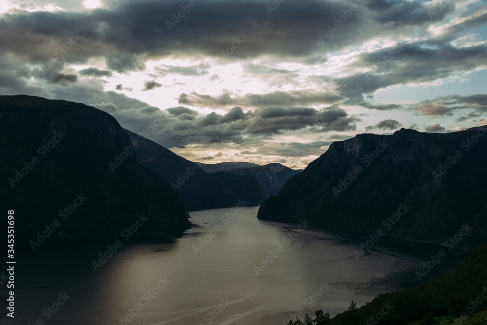 mountains in norway in the evening against the background of the river