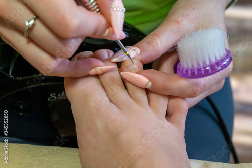 Step-by-step pedicure at home. Concept of toenail care