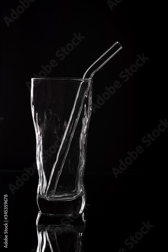 Empty glass silhouette isolated on dark background