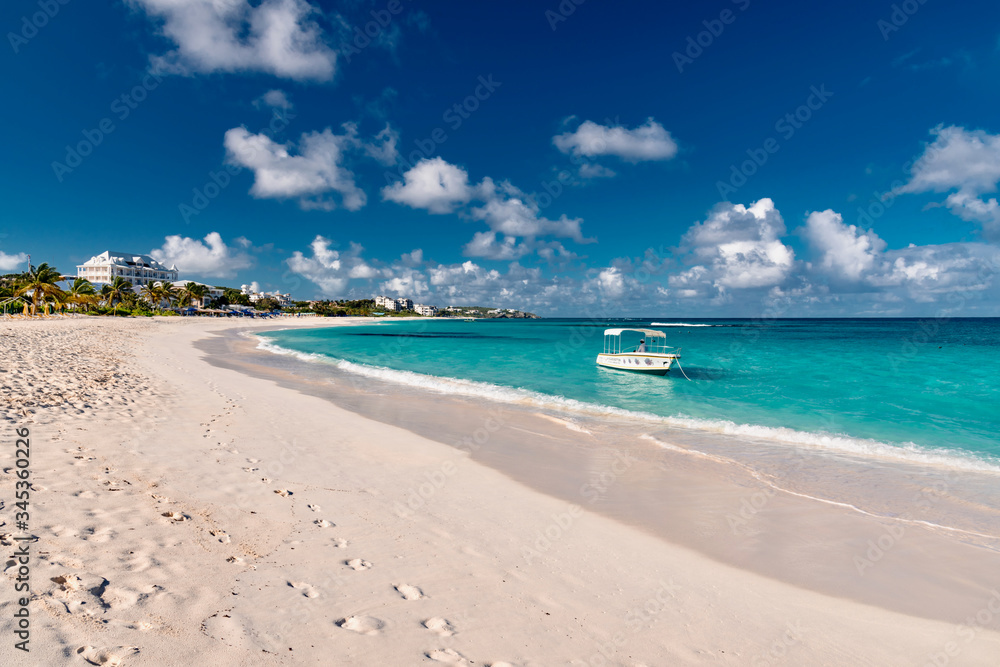 luxury and palm trees on the white sand tropical island of Anguilla