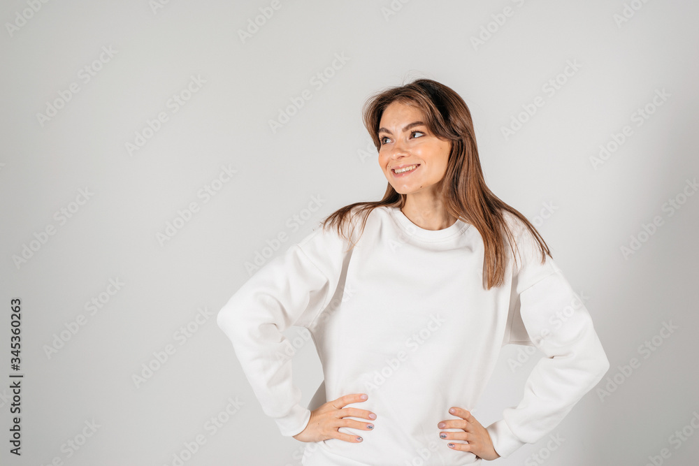 Beautiful smiling young woman. Isolated over white background Beautiful smiling young woman. Isolated over white background