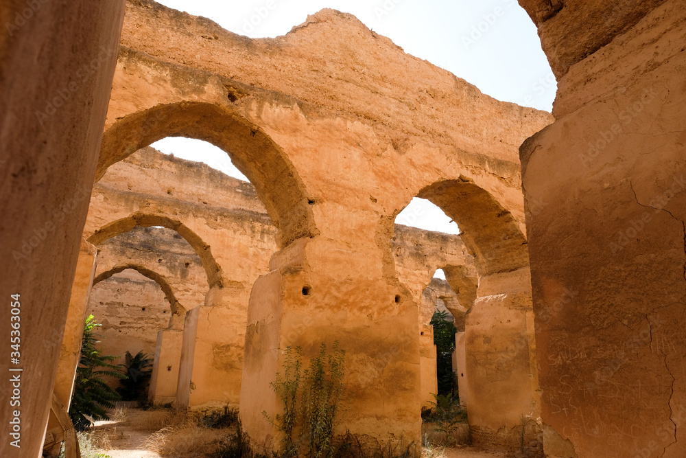 The ancient ruined arches of the massive Royal Stables, Meknes in Morocco.