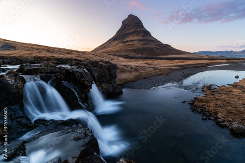 Kirkjufell is one of the most scenic and photographed mountains in Iceland all year around. Beautiful Icelandic landscape of Scandinavia © Marek