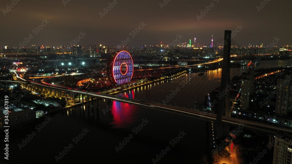 Guangzhou Yuan is the tallest circular building in the world. Huge donut on the banks of the Zhujiang River in Guangzhou