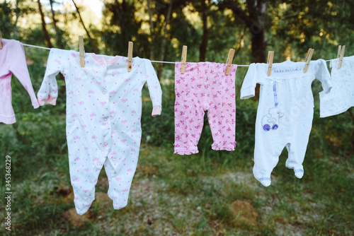 baby clothes hanging on a clothesline
