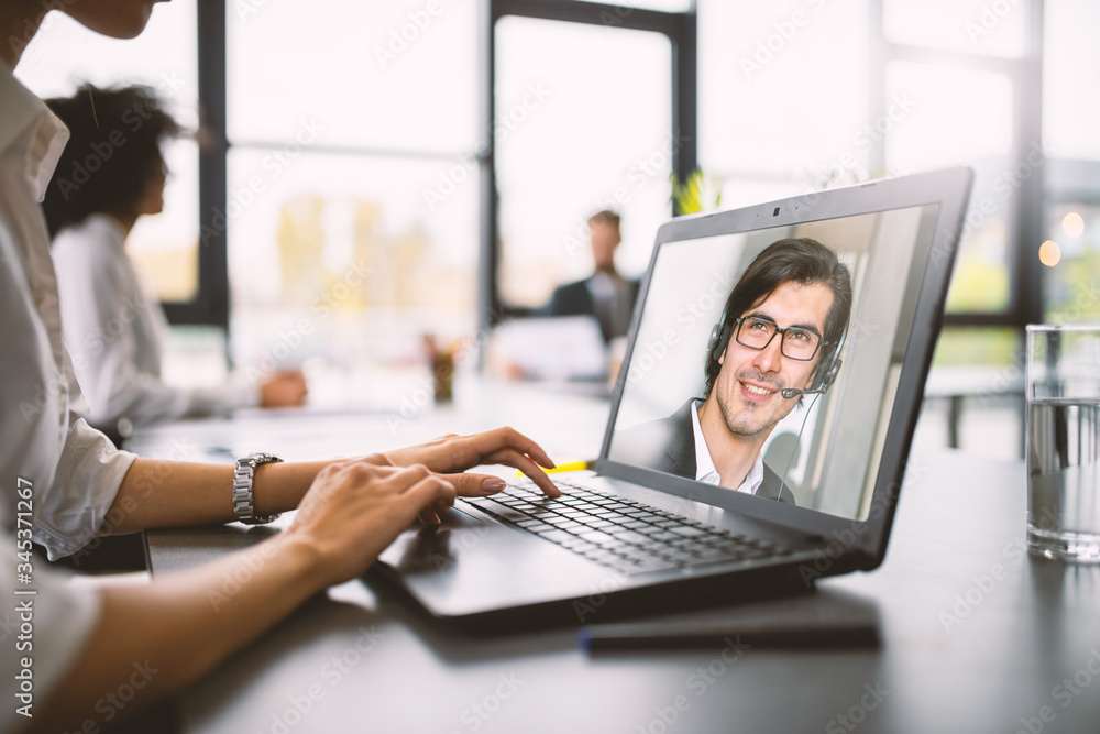 Businessman is working in remote with a videocall due to quarantine of coronavirus covid19. Concept of smart working Businessman is working in remote with a videocall due to quarantine of coronavirus covid19. Concept of smart working