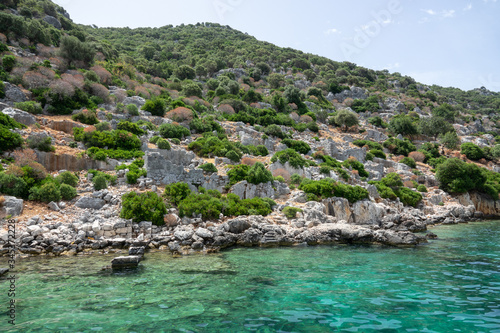 Ruins of sunken ancient city of Dolichiste on the northern part of the Kekova Island. Devastating earthquake in the 2nd century AD © Goldream