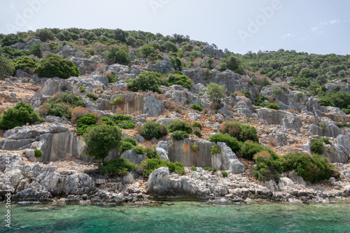 Ruins of sunken ancient city of Dolichiste on the northern part of the Kekova Island. Devastating earthquake in the 2nd century AD © Goldream