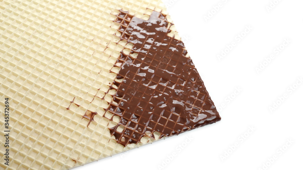 Cream chocolate, topping on wafer, waffle isolated on white background Cream chocolate, topping on wafer, waffle isolated on white background