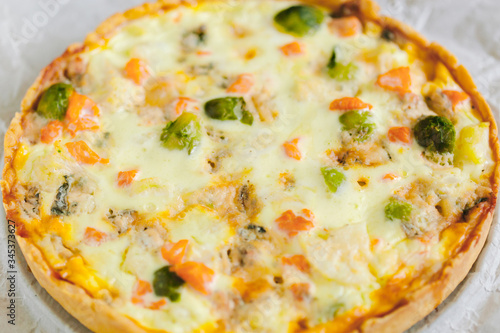 smoked salmon, Brussels sprouts and gorgonzola quiche tart, top view