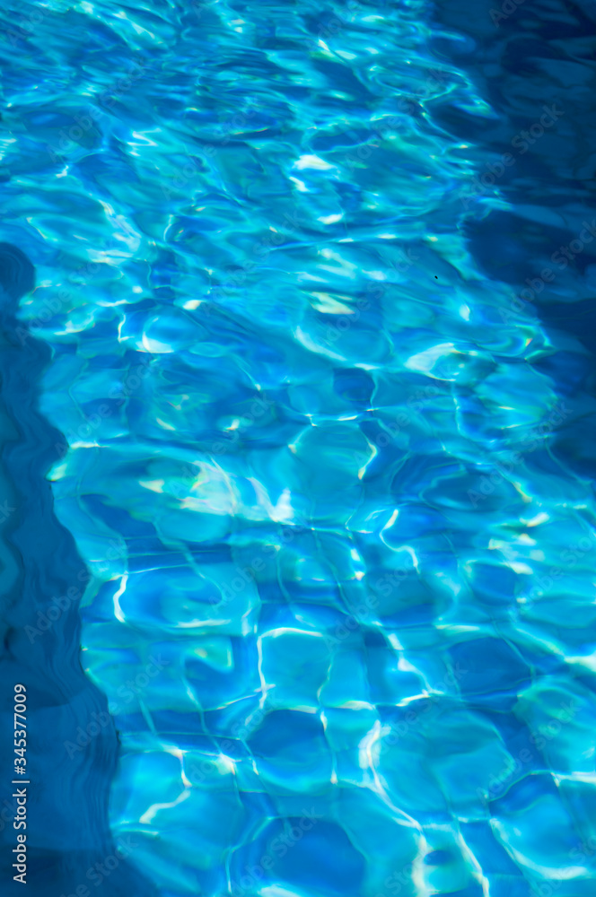 REFLECTION OF THE SUN IN THE POOL