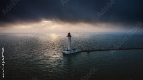 Plakat w ramie Lighthouse in dark clouds