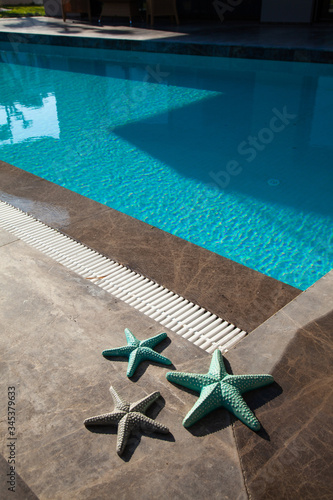 pool background and starfish
