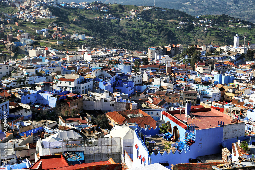 Chefchaouen, Morocco - 02.24.2019: View from the ramparts to a unique city in which all buildings are painted in blue.