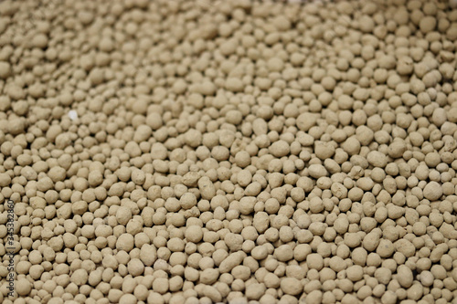 Εκτύπωση καμβά Magnesium lime fertilizer or fertiliser background, chemical granulated fertilizer closeup