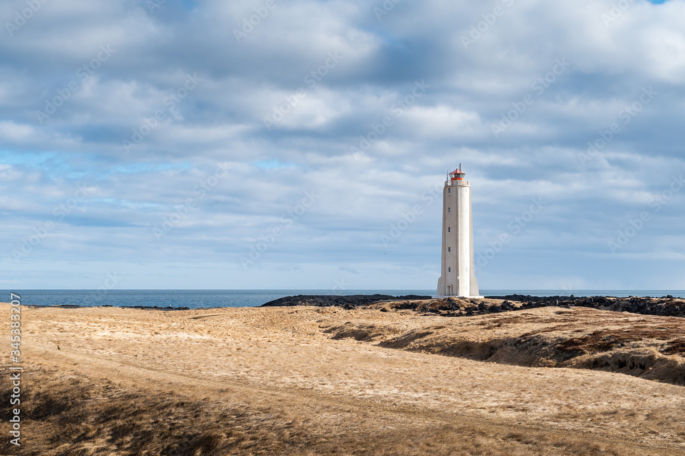 Malarrif Lighthouse on the Snaefelssnes Peninsula in Iceland. Icelandic coast and beautiful scenery of Scandinavia