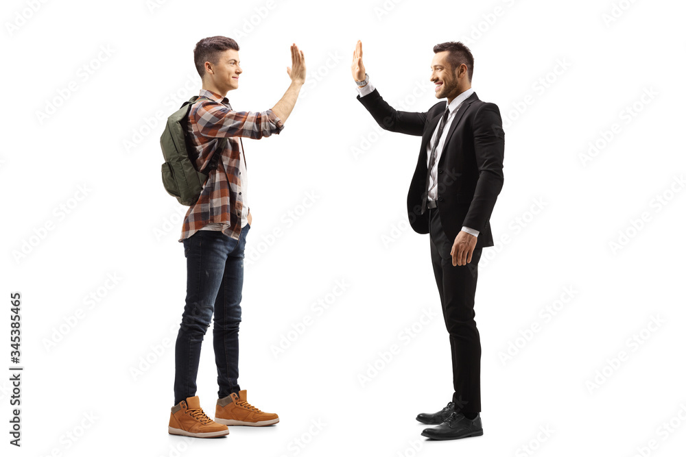 Male student gesturing high-five with a businessman Male student gesturing high-five with a businessman