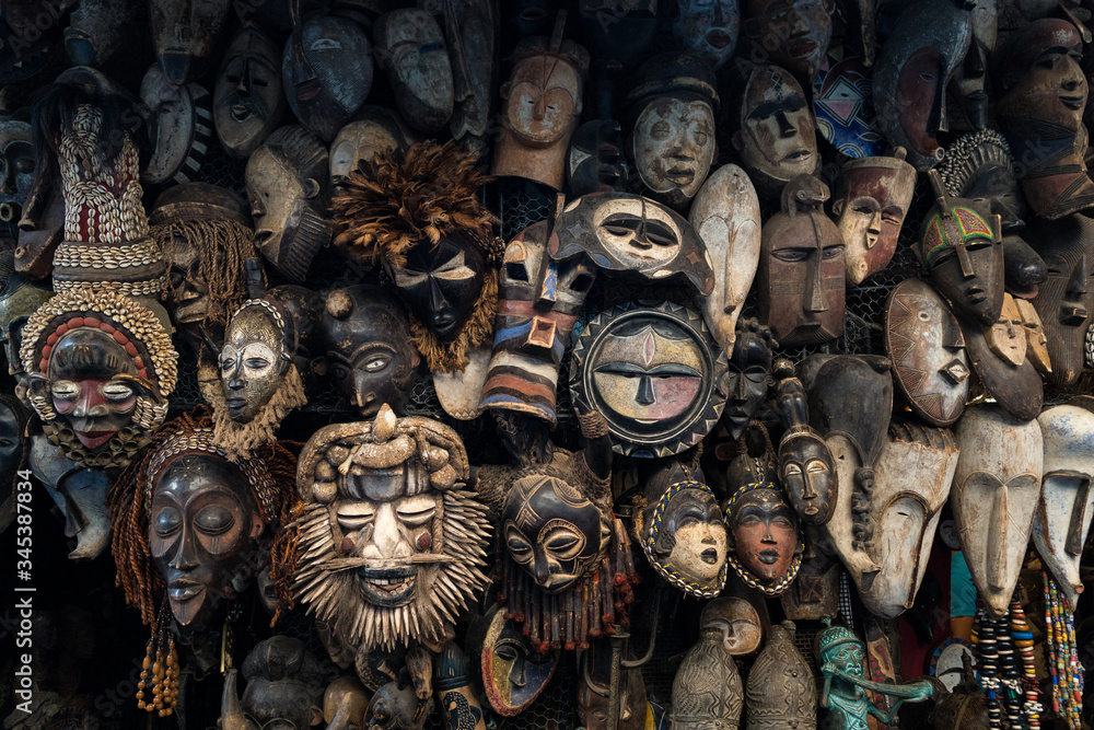 Typical handcrafted wooden masks in the souq of Marrakech Typical handcrafted wooden masks in the souq of Marrakech