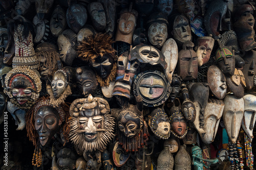 Typical handcrafted wooden masks in the souq of Marrakech