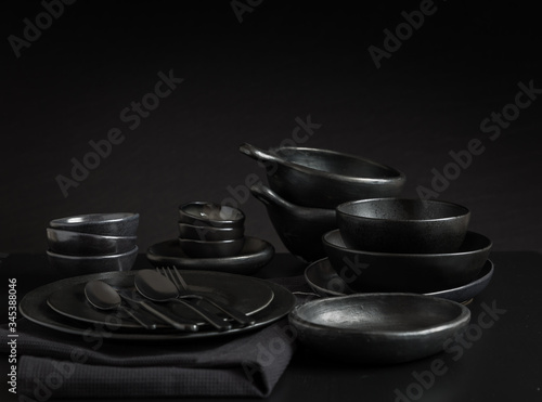 Dishes in minimalistic black design. Pure black.