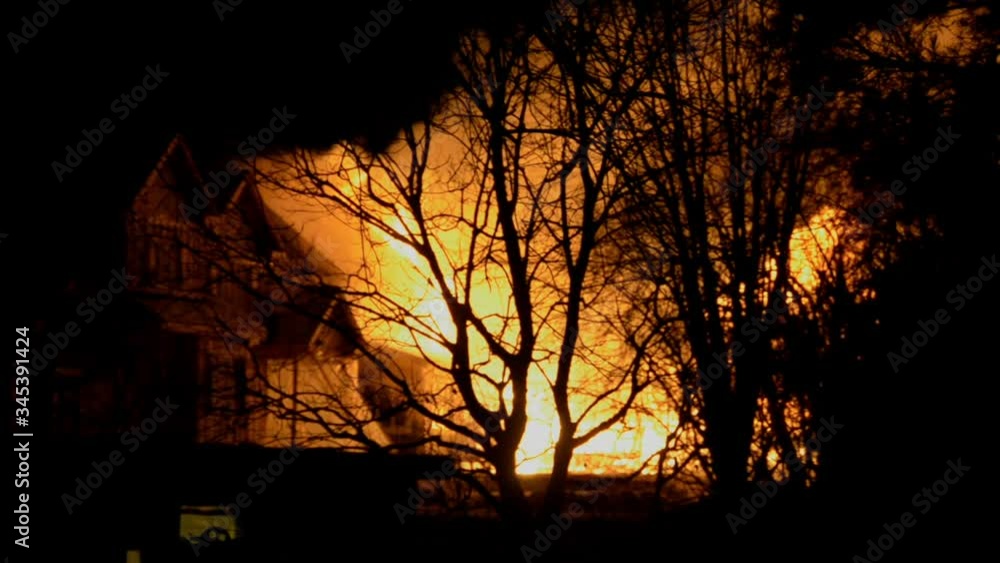 Big Fire of Two Houses Burning During the Night. Huge Flames.
