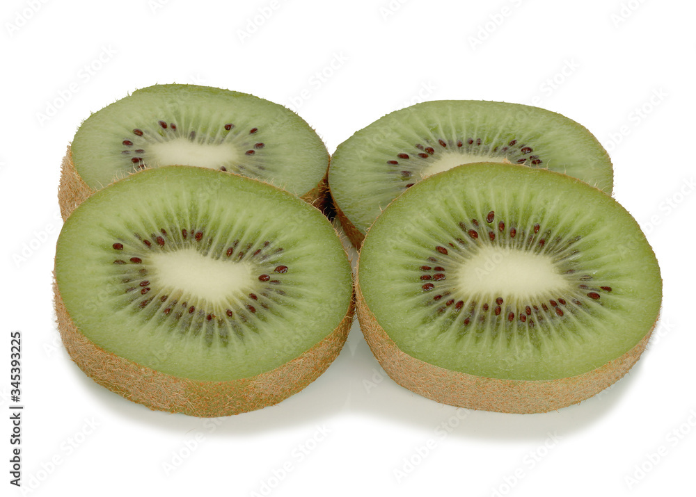 Kiwi fruit sliced segments with shadow on white background . Kiwi fruit sliced segments with shadow on white background .