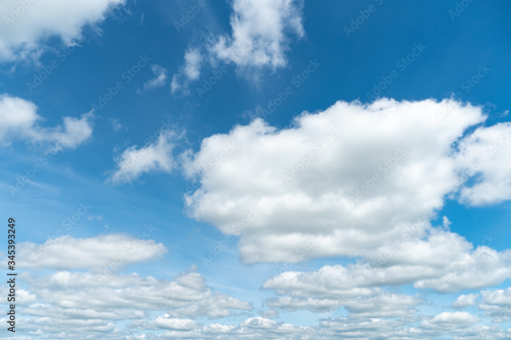 Blue clouds in the sky. Warm sunny day. Blue clouds in the sky. Warm sunny day.