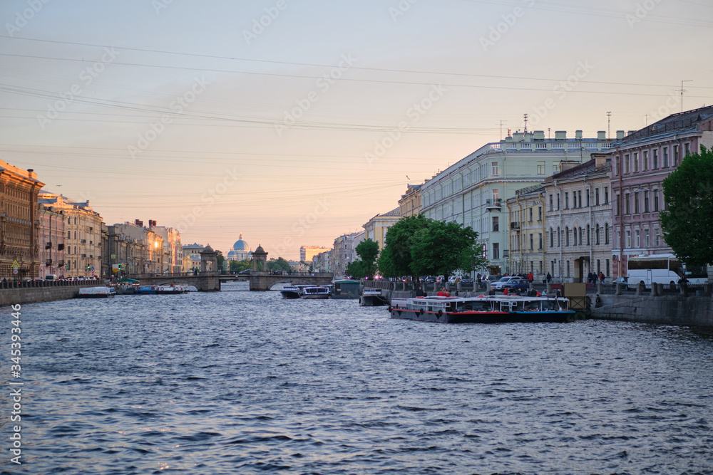 Obraz premium ST. PETERSBURG, RUSSIA - MAY, 2019: Magnificent view of the Fontanka Canal in the center of St. Petersburg. Tourist place. White nights.