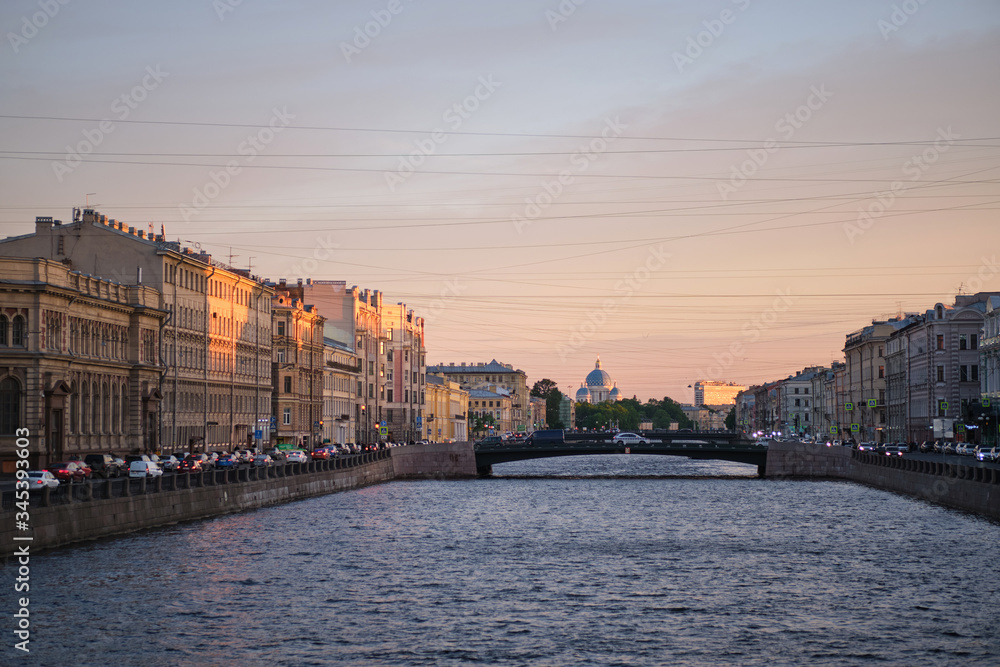 ST. PETERSBURG, RUSSIA - MAY, 2019: Magnificent view of the Fontanka Canal in the center of St. Petersburg. Tourist place. White nights.