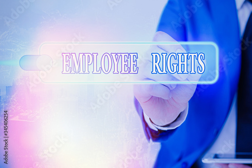 Writing note showing Employee Rights. Business concept for All employees have basic rights in their own workplace photo