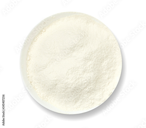 Ceramic bowl of flour isolated on white background Top view