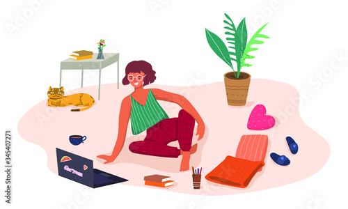 A young woman is studying from home. A girl with a laptop sits on the floor with books, pens and tea. Communication via the Internet, online conference or work from home concept. Cartoon modern flat i