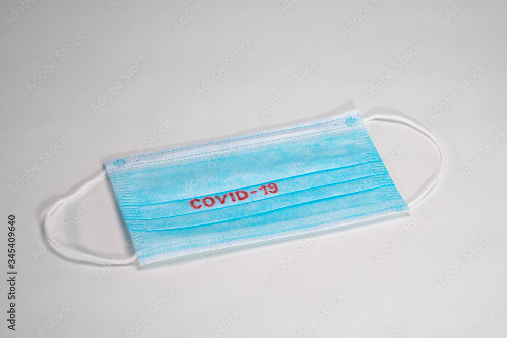 COVID-19. Facial masks on the pile. Epidemic background. Shortage of facial masks at drug store. Quarantine background. Medical masks for protection. Dangerous virus. COVID-19. Facial masks on the pile. Epidemic background. Shortage of facial masks at drug store. Quarantine background. Medical masks for protection. Dangerous virus.