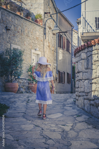 little lovely girl posing in Croatian street