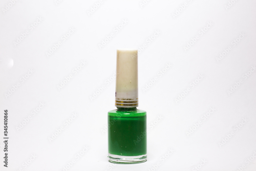 green Nail polish bottle on white background green Nail polish bottle on white background