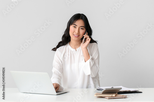 Beautiful Asian secretary t...