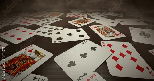 Playing cards on the table in cigarette smoke
