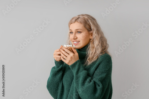 Beautiful young woman with ...