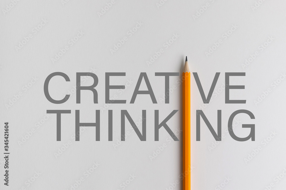 Fototapeta premium Yellow pencil photo composition interacting replace to i of gray creative thinking words to use for education, business or creativity presentation.