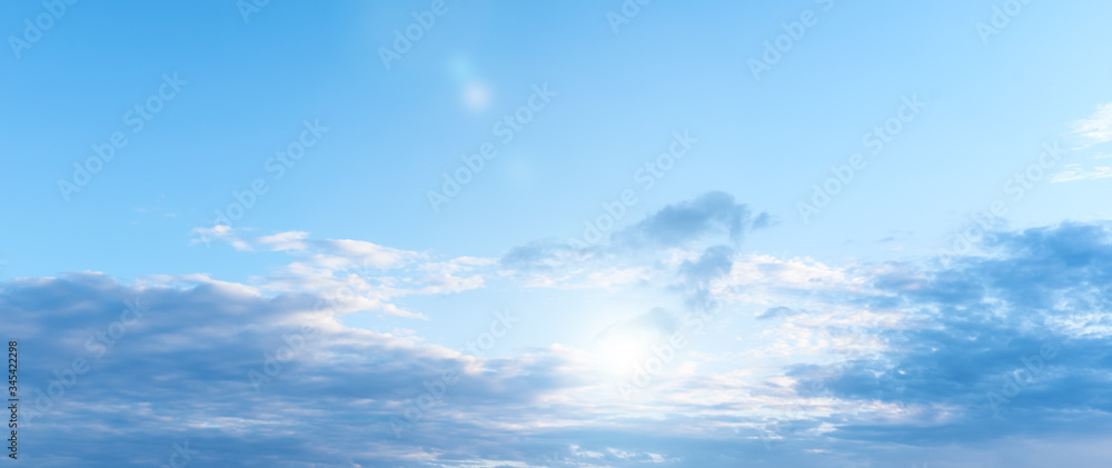 blue sky during sunset with white clouds. place for text