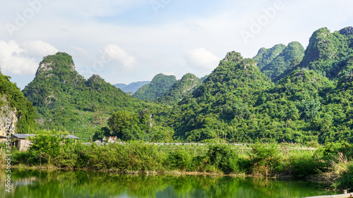 A beautiful landscape of green hills, mountains and river in YingDe, China