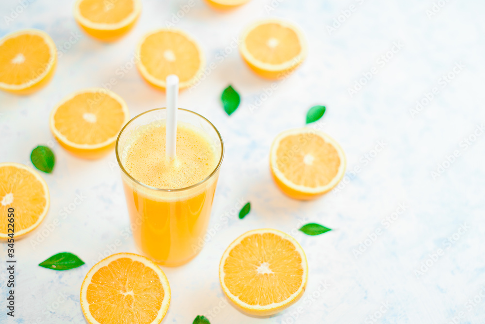 fresh orange Juice and oranges on the cutting board fresh orange Juice and oranges on the cutting board