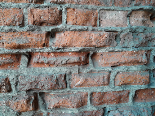 Fragment of the wall of an industrial old building. Old brickwork. Mining processing plant. Color photo. Horizontal frame. Picture taken in Ukraine  Dnipropetrovsk region.