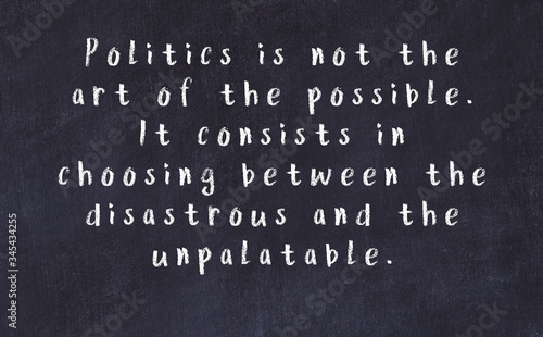 Chalk inscription of smart quote on black desk